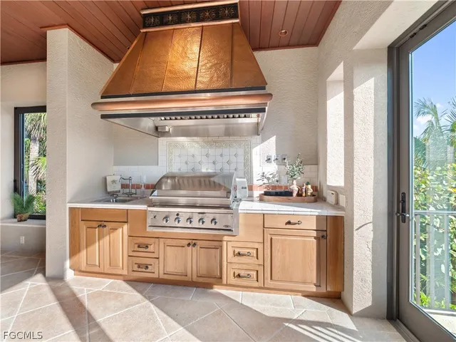 a view of entryway with a chandelier and living room