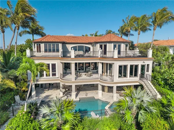an aerial view of a ocean view and beach