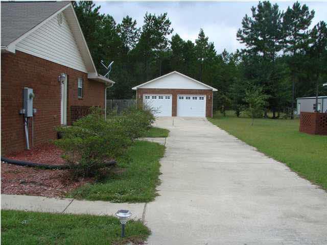 9115 Byrom Campbell Road Pace, FL 32571 - Photo 25 of 25 Long Drive to Detached Garage