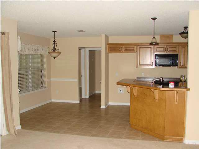 9115 Byrom Campbell Road Pace, FL 32571 - Photo 8 of 25 Great Room to Kitchen/Breakfast Nook
