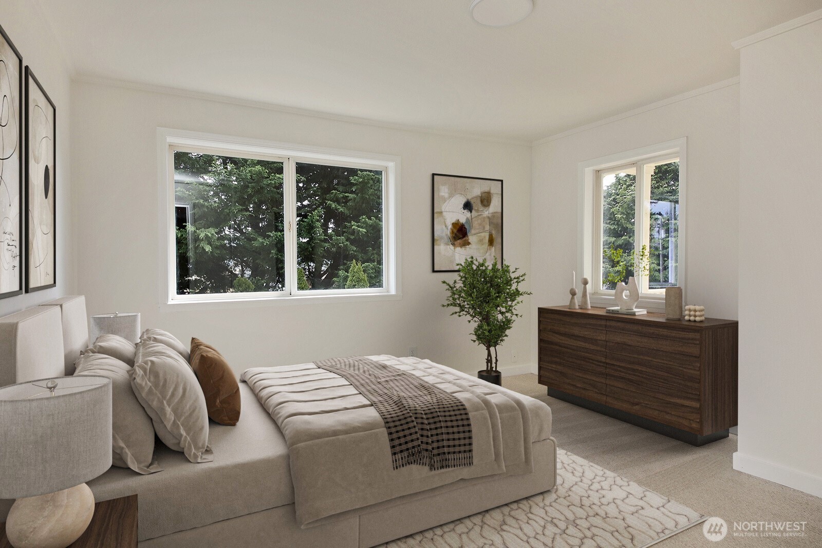 3760 Periwinkle Road Clinton, WA 98236 - Photo 22 of 34 a bed sitting in a bedroom next to a window