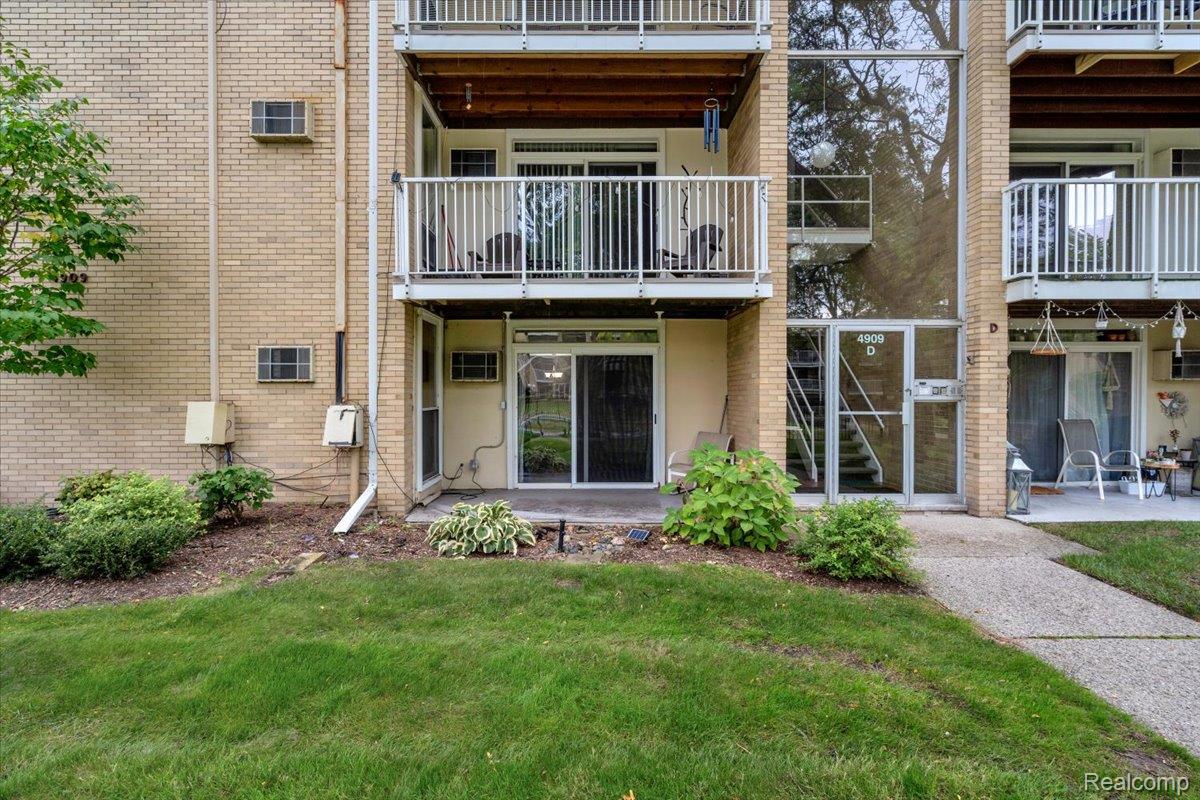 4909 North Crooks Road, Unit D1 Royal Oak, MI 48073 - Photo 2 of 21 Back Entrance and Private Patio