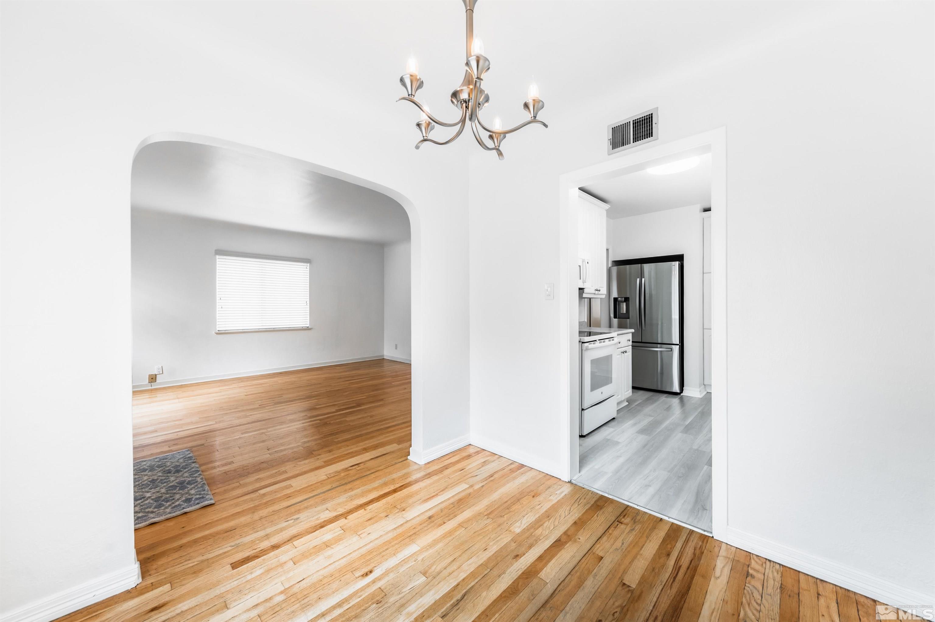 17 Linwood Place Reno, NV 89509 - Photo 14 of 36 a view of a room with wooden floor and staircase