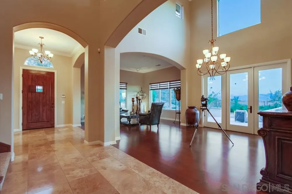 8248 Fortuna Santa Fe Road San Diego, CA 92127 - Photo 11 of 24 a lobby with furniture and dining room