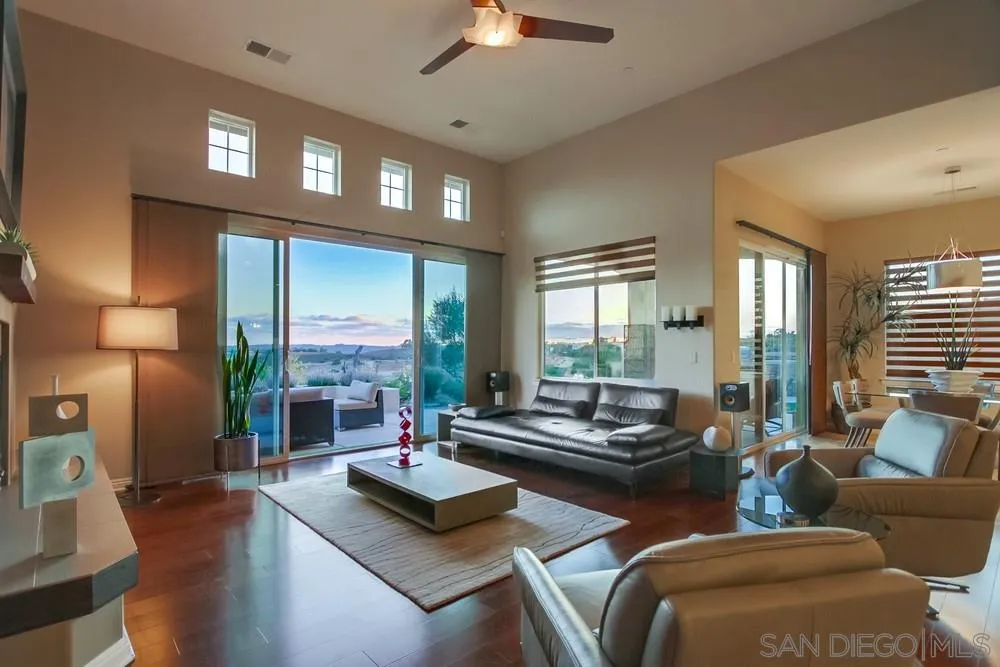 8248 Fortuna Santa Fe Road San Diego, CA 92127 - Photo 14 of 24 a living room with furniture and a large window