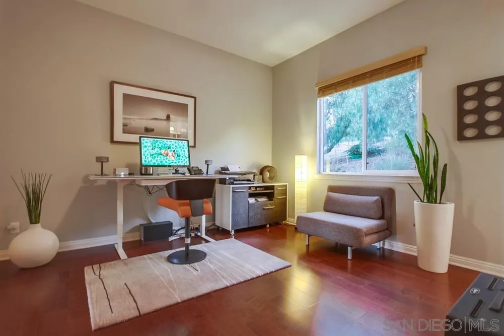 8248 Fortuna Santa Fe Road San Diego, CA 92127 - Photo 24 of 24 a room with furniture and a window