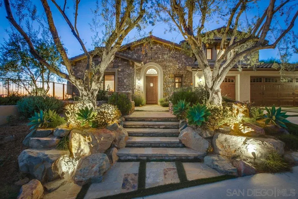 8248 Fortuna Santa Fe Road San Diego, CA 92127 - Photo 3 of 24 a front view of a house
