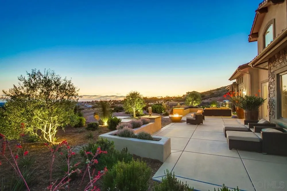 8248 Fortuna Santa Fe Road San Diego, CA 92127 - Photo 8 of 24 a view of a terrace with sitting area