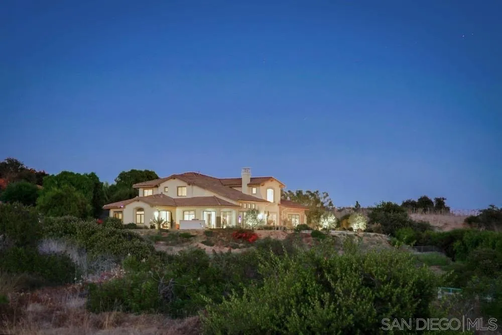 8248 Fortuna Santa Fe Road San Diego, CA 92127 - Photo 9 of 24 a view of a big yard in a field of a house