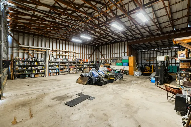 a view of a garage with chairs