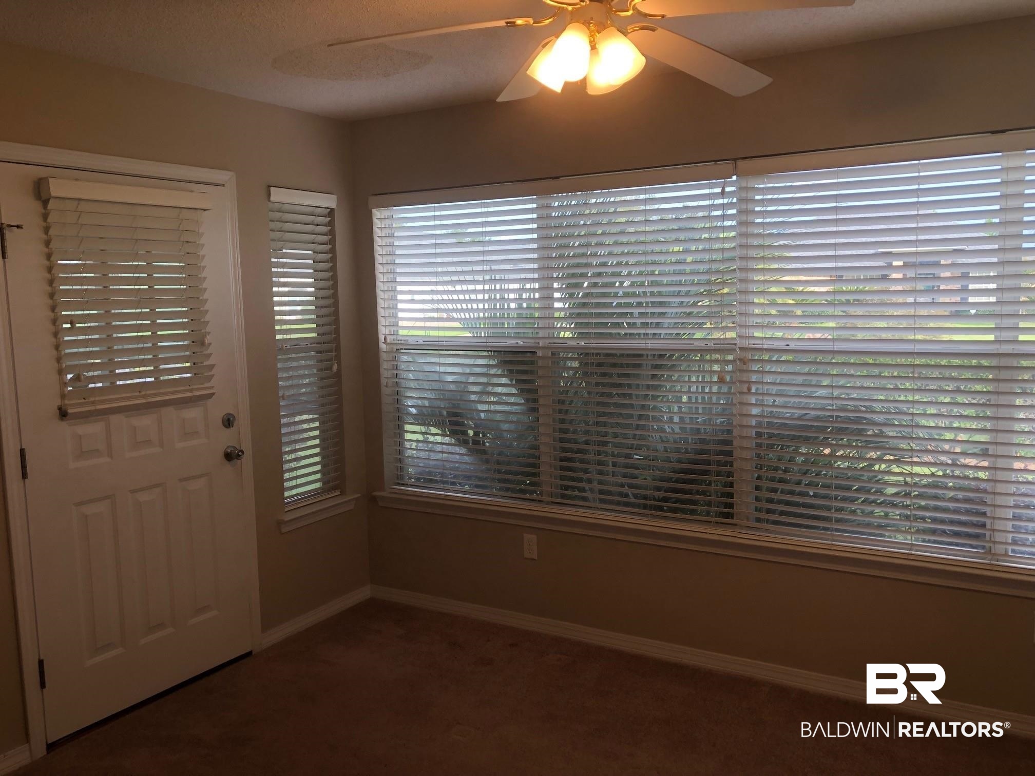 9394 Villas Drive, Unit 26B Foley, AL 36535 - Photo 12 of 14 Sunroom
