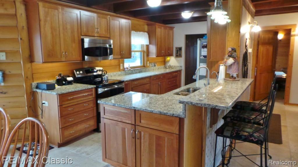 2447 North Hacker Road Howell, MI 48855 - Photo 3 of 62 Stunning remodeled kitchen