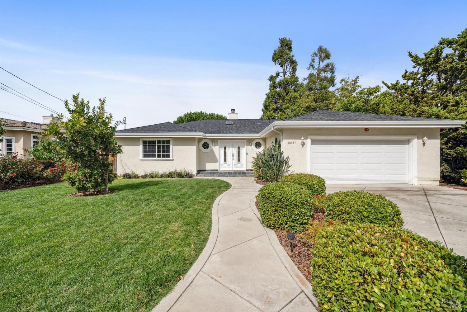 18677 McCoy Avenue Saratoga, CA 95070 - Photo 1 of 1 front view of a house with a yard