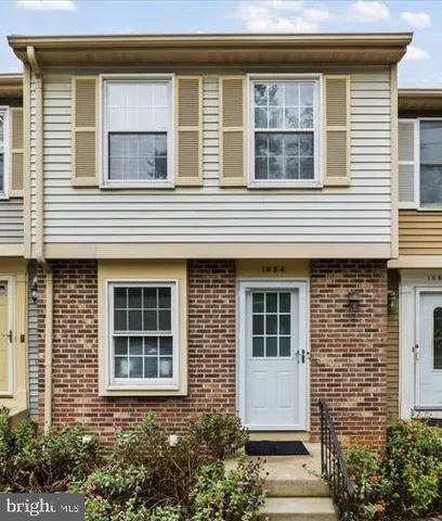 a front view of a house with windows