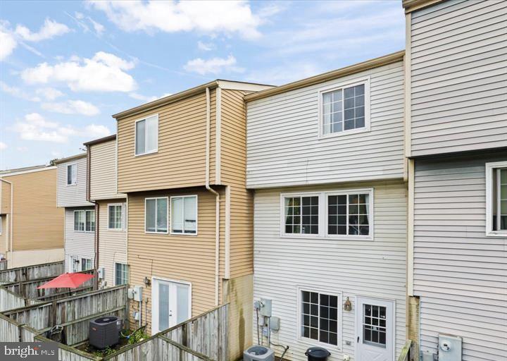 1654 Devil Lane Woodbridge, VA 22192 - Photo 16 of 21 a view of a house with wooden fence