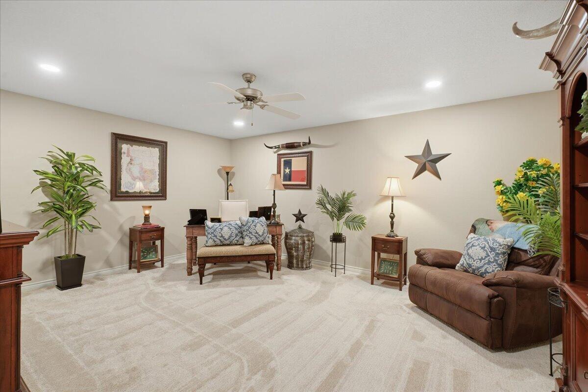 4612 100th Street Lubbock, TX 79424 - Photo 46 of 55 a living room with furniture potted plant and a window