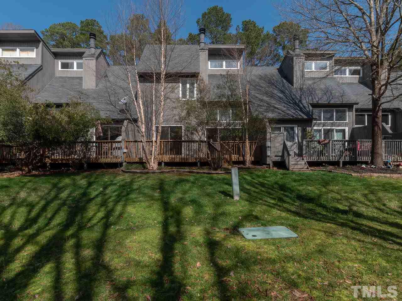 4407 Sunscape Lane Raleigh, NC 27613 - Photo 3 of 29 a view of a house with a backyard