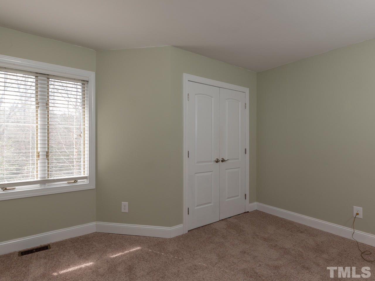 4407 Sunscape Lane Raleigh, NC 27613 - Photo 22 of 29 an empty room with a window