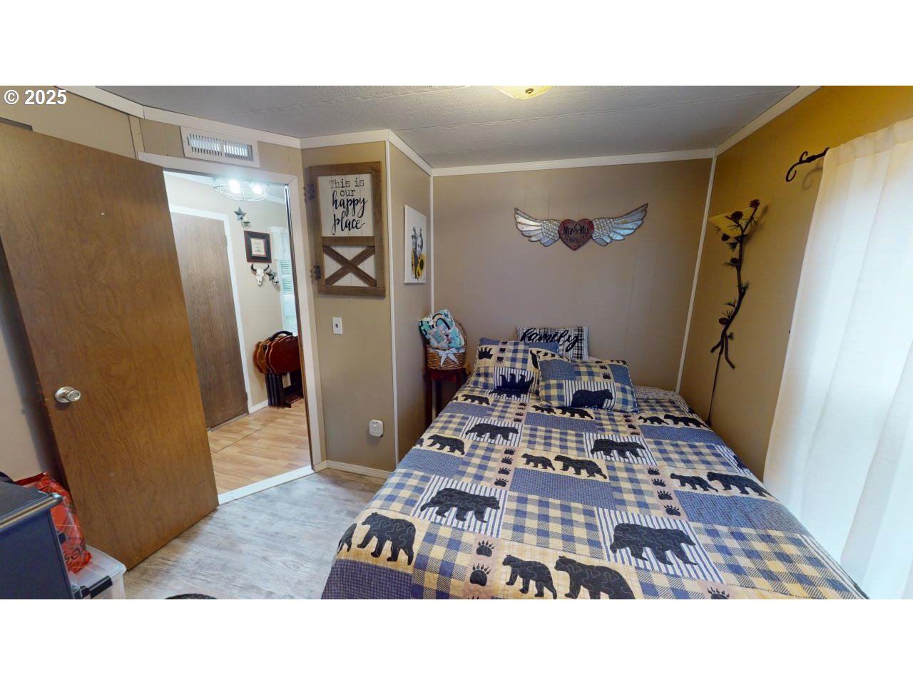 94608 Grange Road Gold Beach, OR 97444 - Photo 14 of 29 a living room with a rug and wooden floor