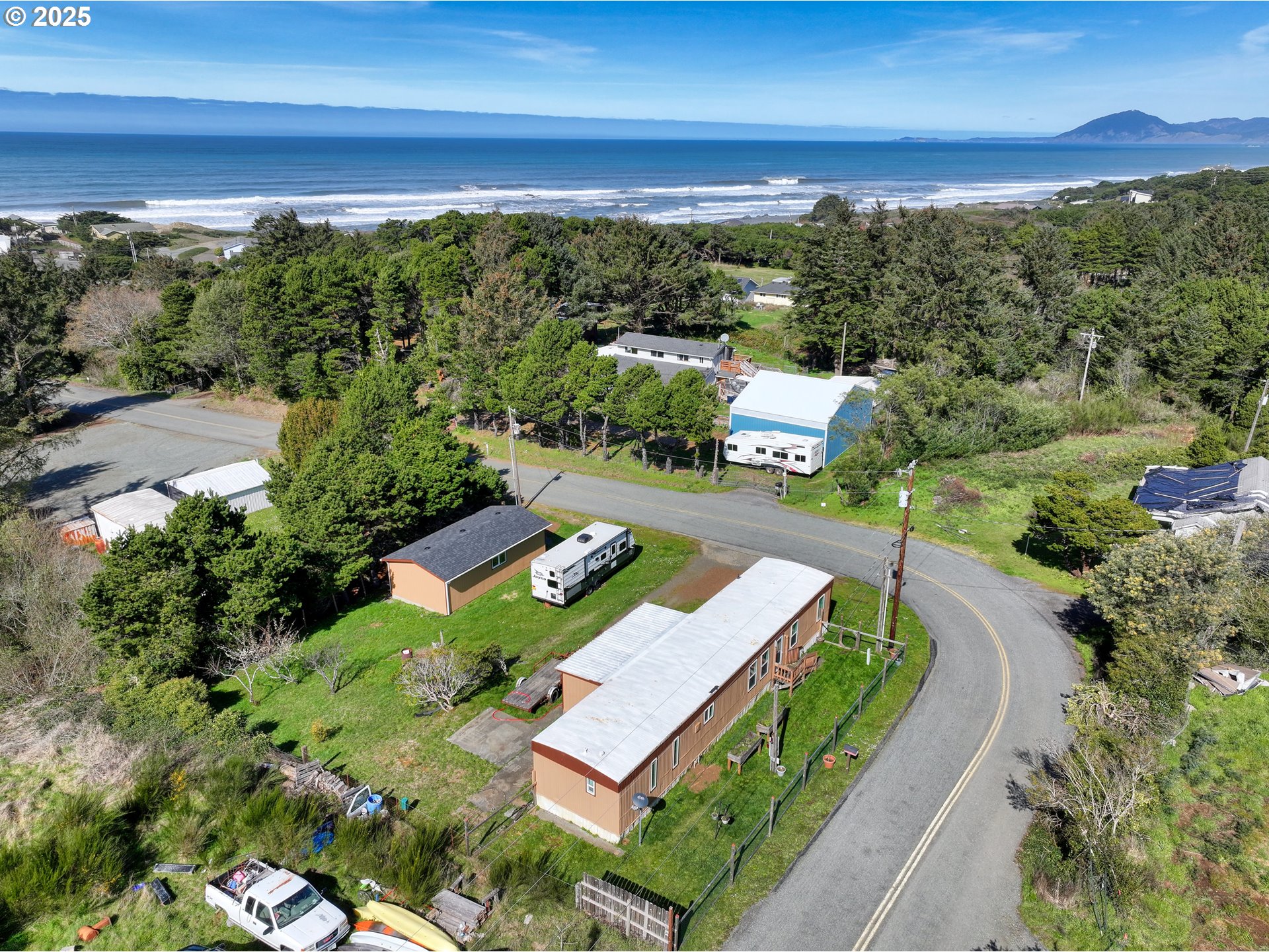 94608 Grange Road Gold Beach, OR 97444 - Photo 2 of 29 a view of a city with floor to ceiling windows with wooden floor