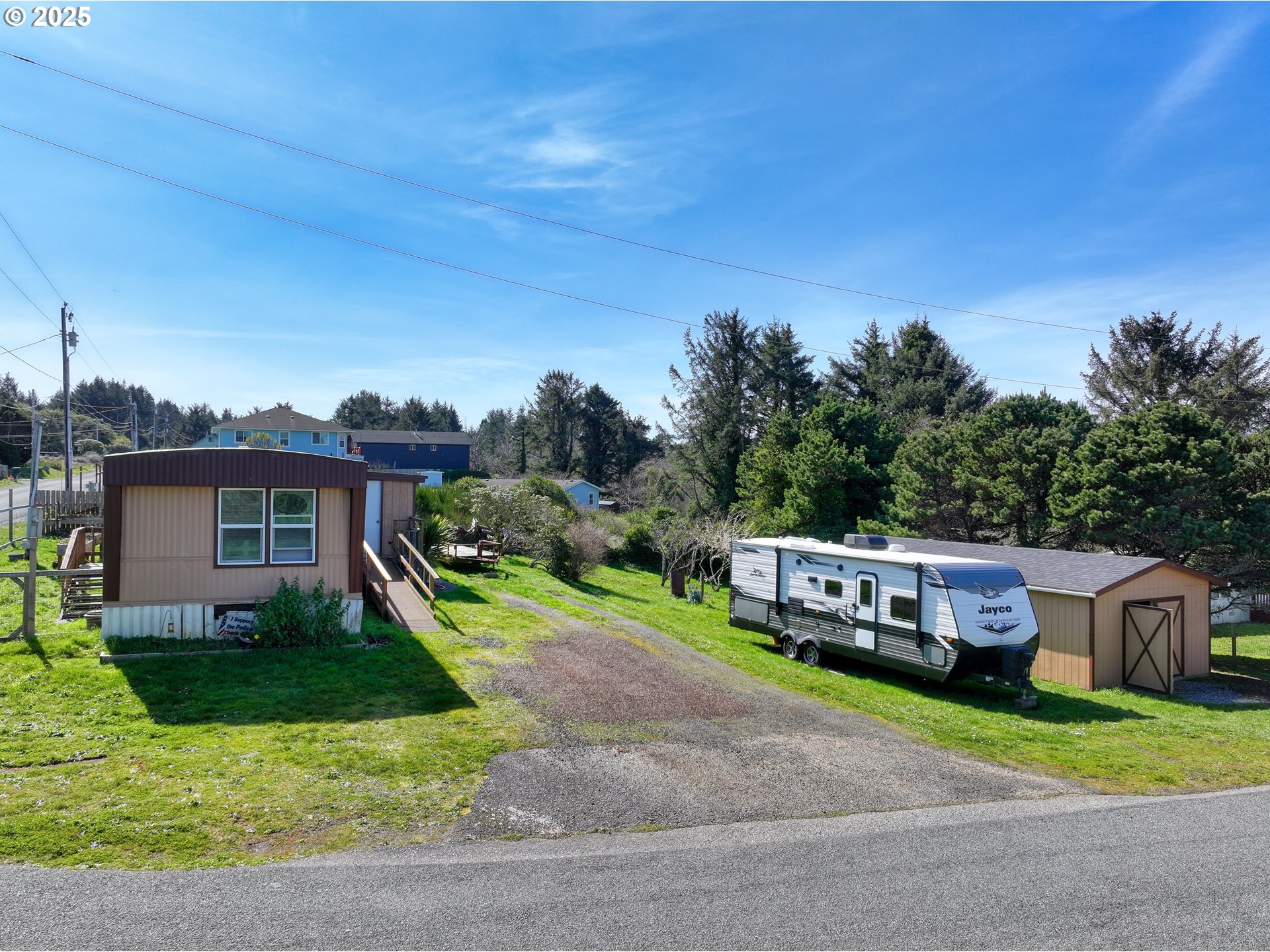 94608 Grange Road Gold Beach, OR 97444 - Photo 23 of 29 a view of house with a yard