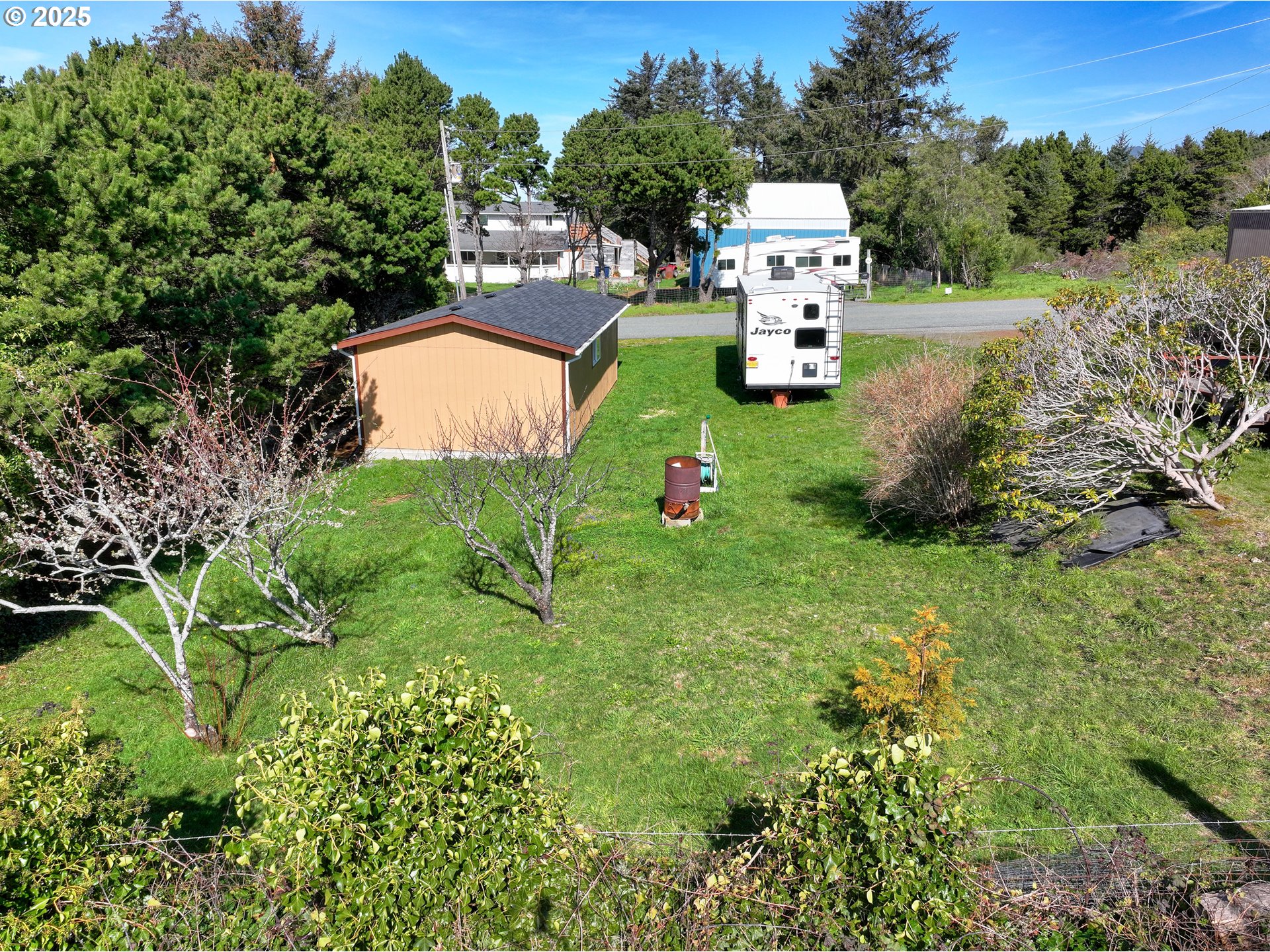 94608 Grange Road Gold Beach, OR 97444 - Photo 26 of 29 an aerial view of a house with yard swimming pool and outdoor seating