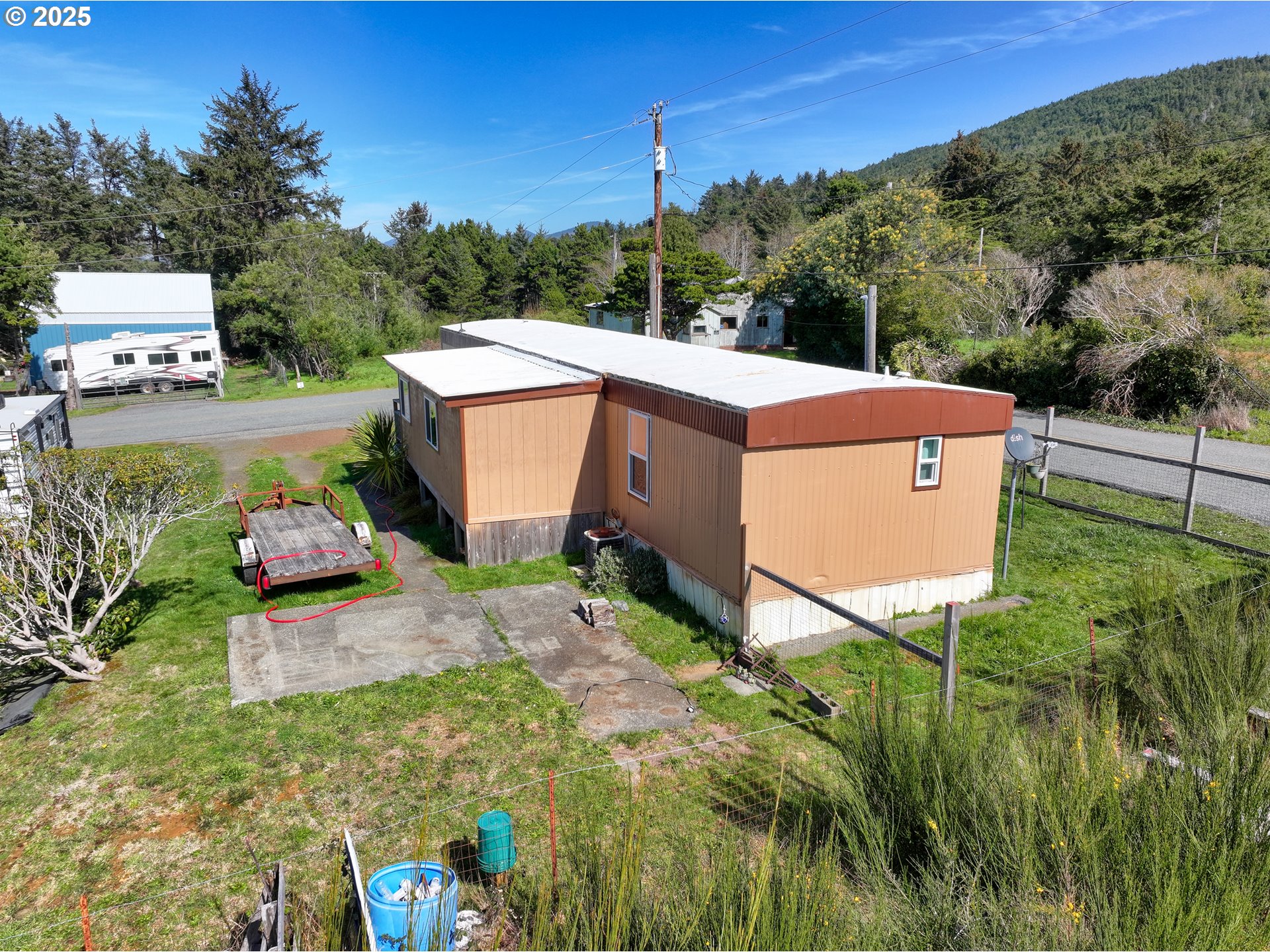 94608 Grange Road Gold Beach, OR 97444 - Photo 27 of 29 a view of a garden with a sink and yard