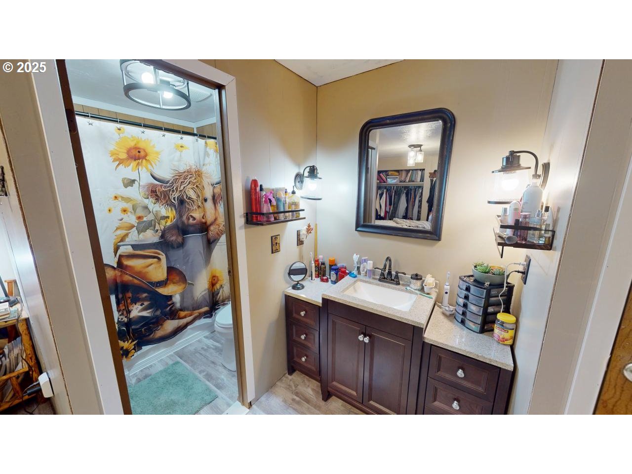 94608 Grange Road Gold Beach, OR 97444 - Photo 10 of 29 a bathroom with a sink vanity and a mirror