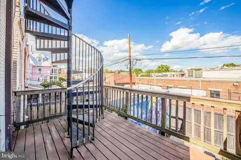a view of city from a balcony