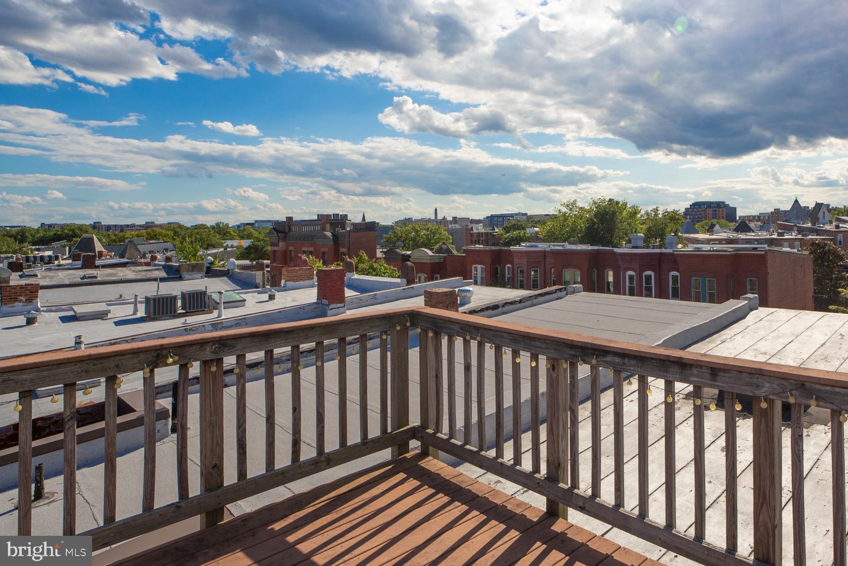 1823 4th Street Northwest Washington, DC 20001 - Photo 34 of 48 a view of a balcony with wooden fence