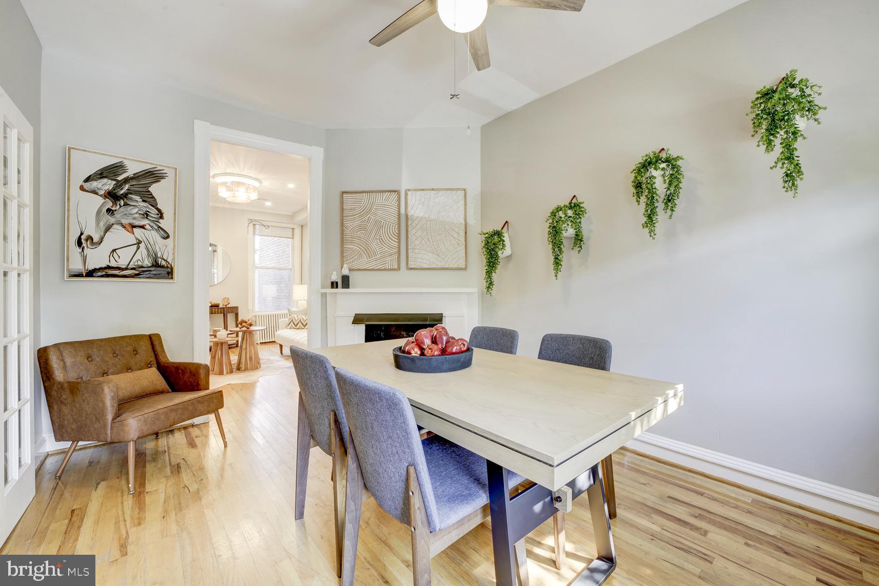 1823 4th Street Northwest Washington, DC 20001 - Photo 7 of 48 a view of a dining room with furniture and a chandelier