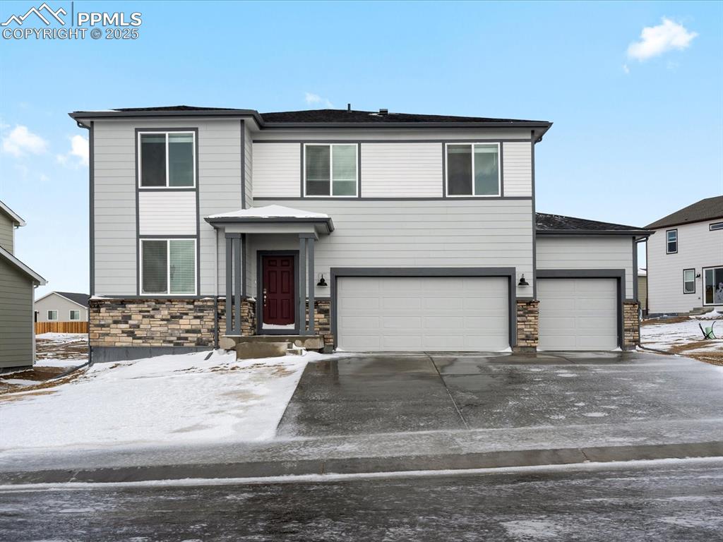 a front view of a house with yard