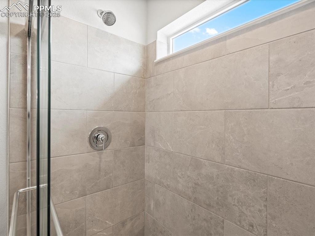 10648 Waterloo Drive Peyton, CO 80831 - Photo 29 of 36 a bathroom with a shower