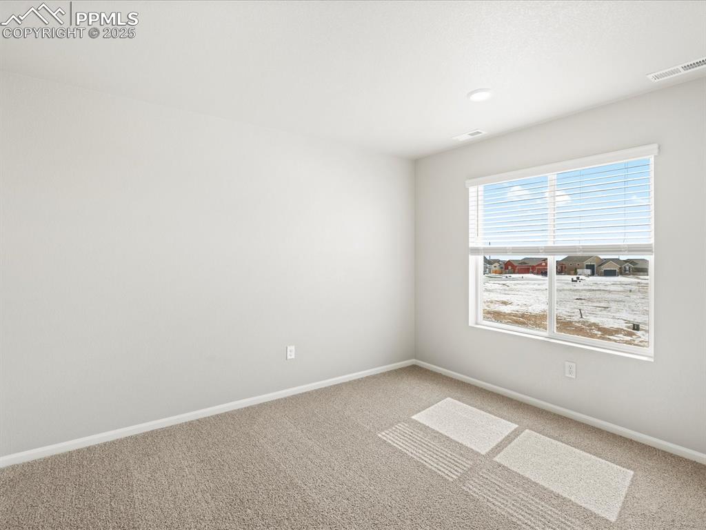 10648 Waterloo Drive Peyton, CO 80831 - Photo 30 of 36 an empty room with a window