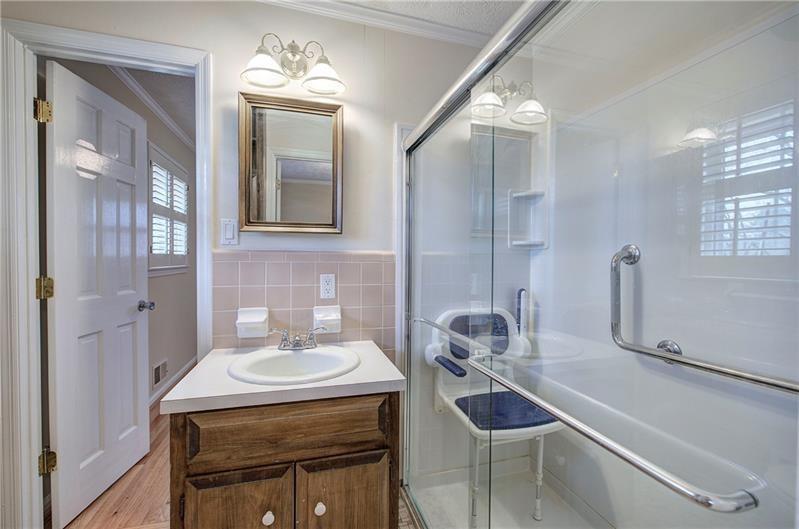 408 Mac Johnson Road Northwest Cartersville, GA 30121 - Photo 33 of 65 a bathroom with a sink and a mirror