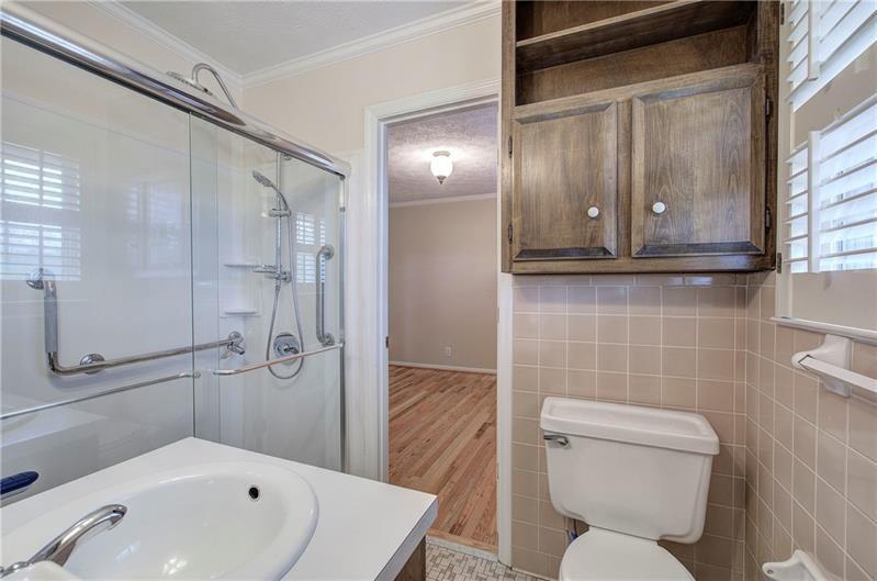 408 Mac Johnson Road Northwest Cartersville, GA 30121 - Photo 34 of 65 a bathroom with a toilet sink and shower