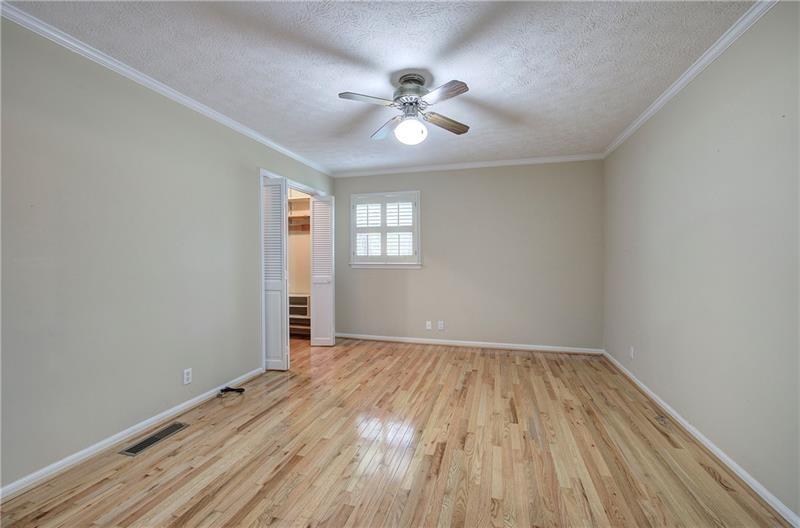 408 Mac Johnson Road Northwest Cartersville, GA 30121 - Photo 37 of 65 wooden floor in an empty room with a window