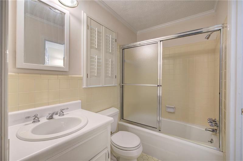 408 Mac Johnson Road Northwest Cartersville, GA 30121 - Photo 40 of 65 a bathroom with a sink toilet and shower