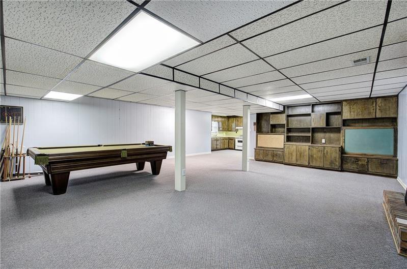 408 Mac Johnson Road Northwest Cartersville, GA 30121 - Photo 44 of 65 a room with lots of furniture and a wooden floors