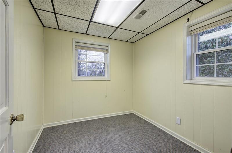408 Mac Johnson Road Northwest Cartersville, GA 30121 - Photo 51 of 65 a view of an empty room with a window