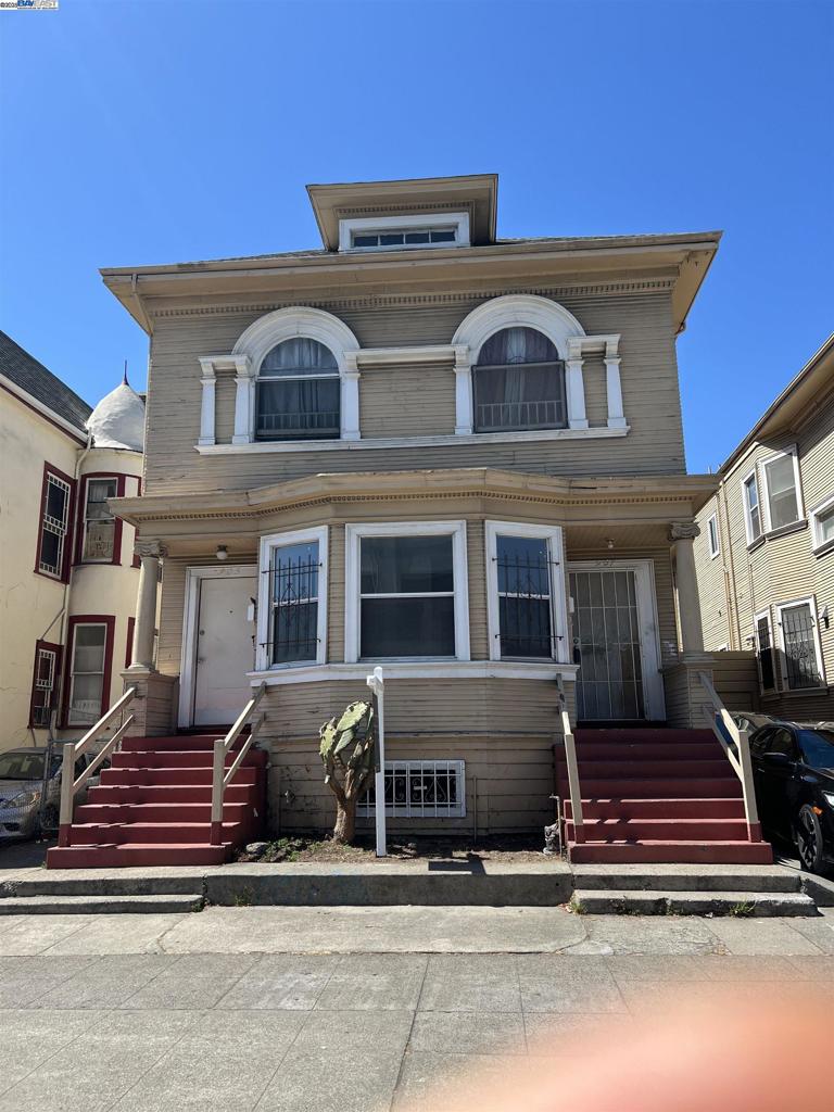 a front view of a building with glass windows