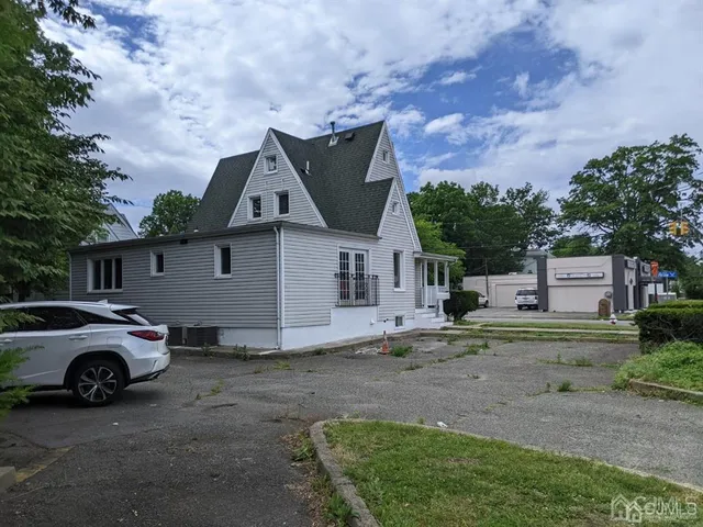 a view of a car in front of house