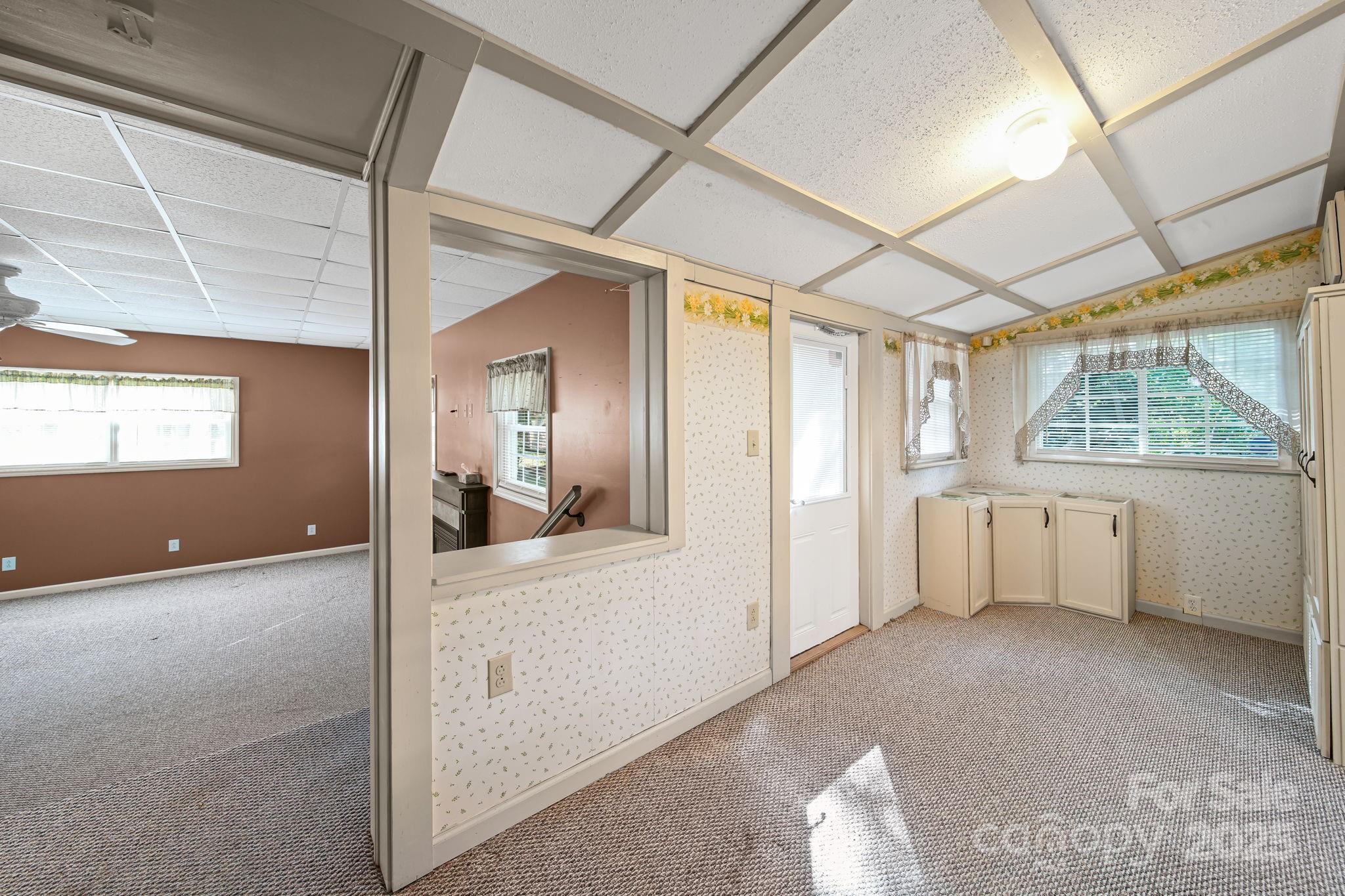 210 Smith Street Clover, SC 29710 - Photo 17 of 33 a view of an empty room with a window