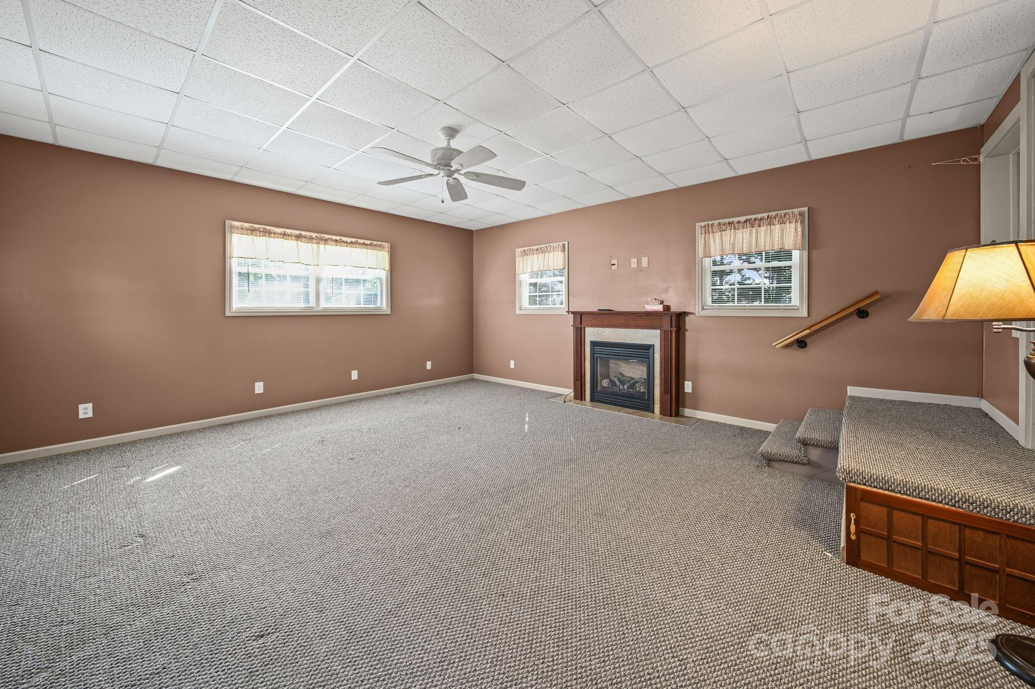 210 Smith Street Clover, SC 29710 - Photo 19 of 33 a view of an empty room with a window