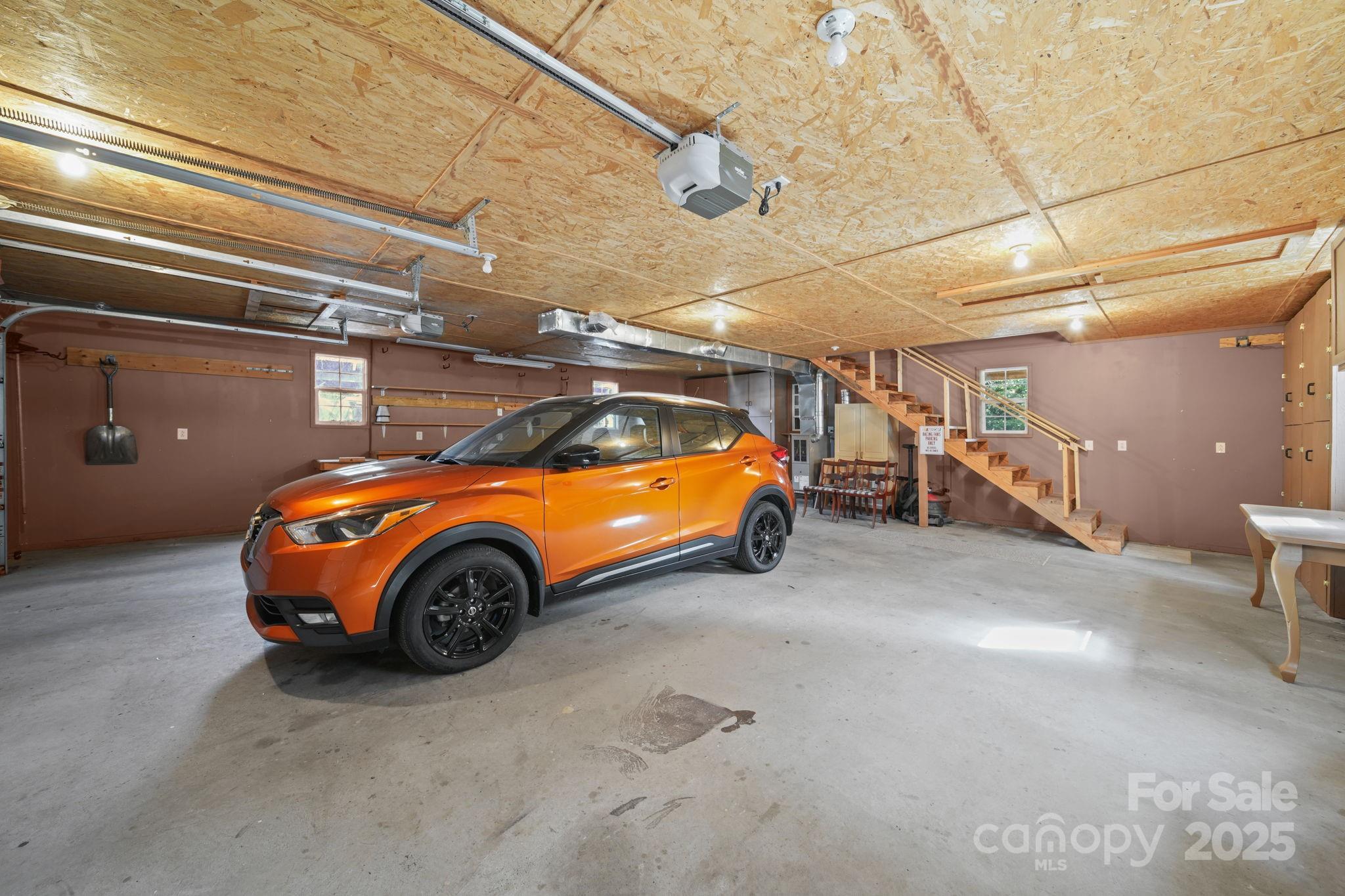 210 Smith Street Clover, SC 29710 - Photo 21 of 33 a car parked in a garage