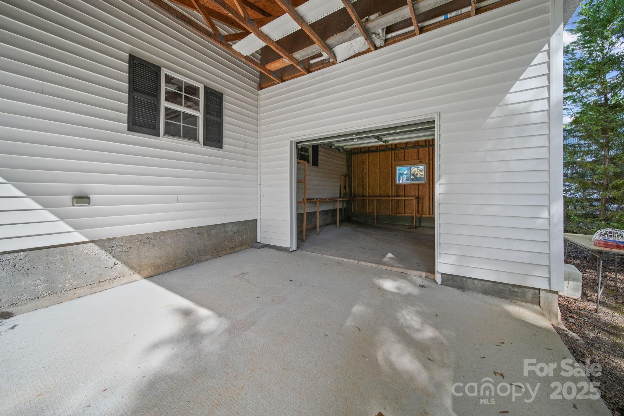210 Smith Street Clover, SC 29710 - Photo 26 of 33 a view of backyard and utility room