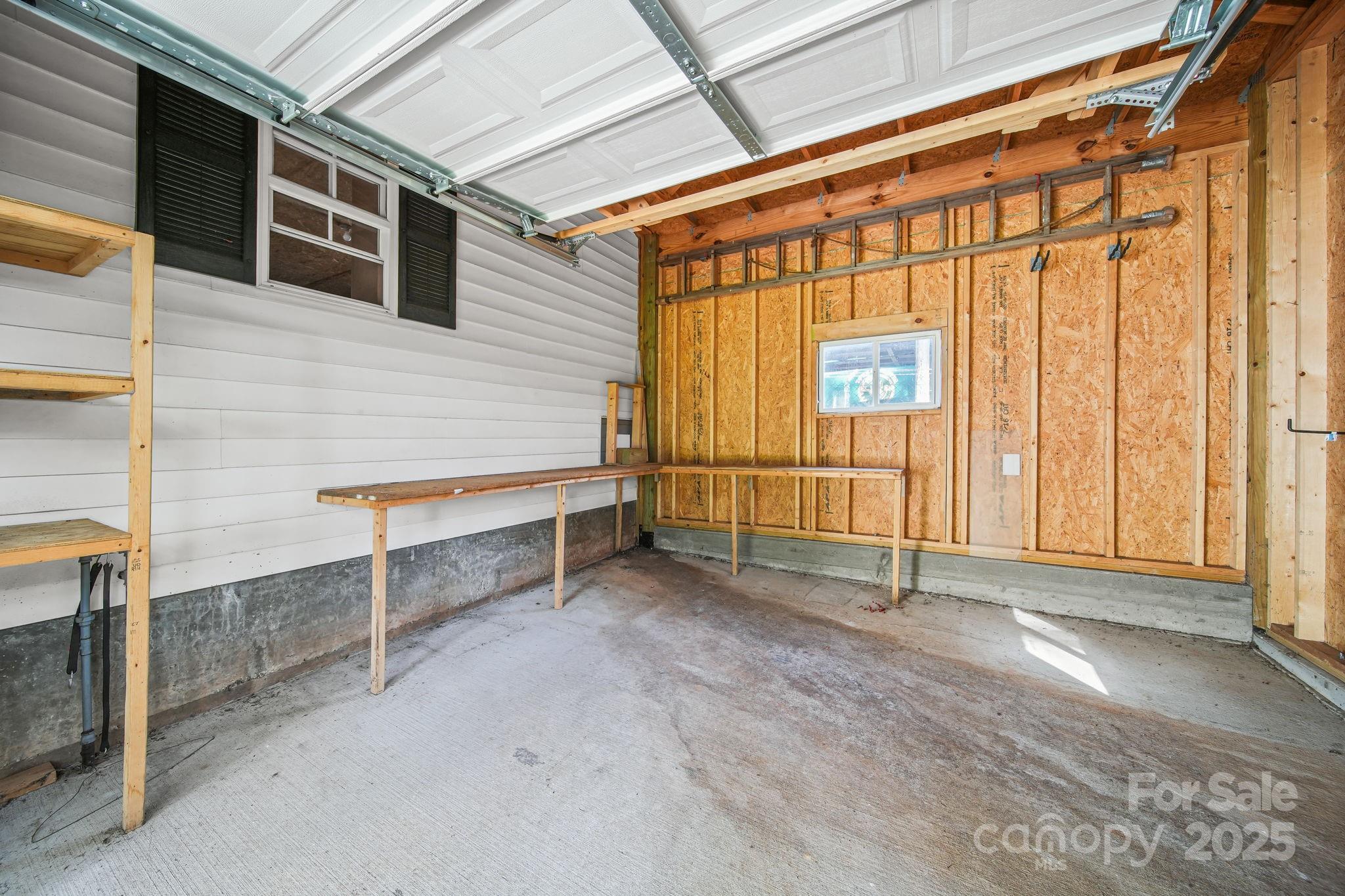 210 Smith Street Clover, SC 29710 - Photo 27 of 33 a view of an empty room with windows