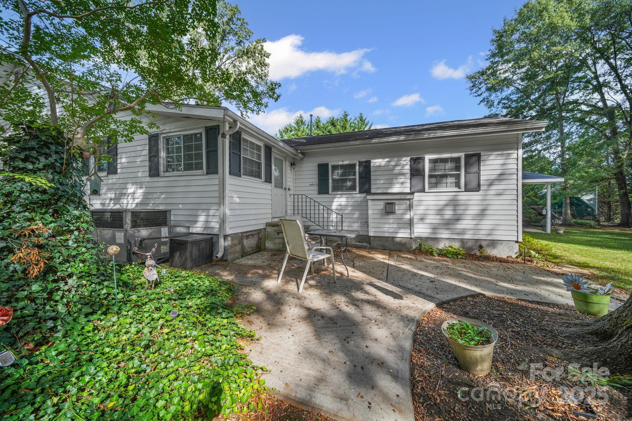 210 Smith Street Clover, SC 29710 - Photo 31 of 33 a front view of a house with garden