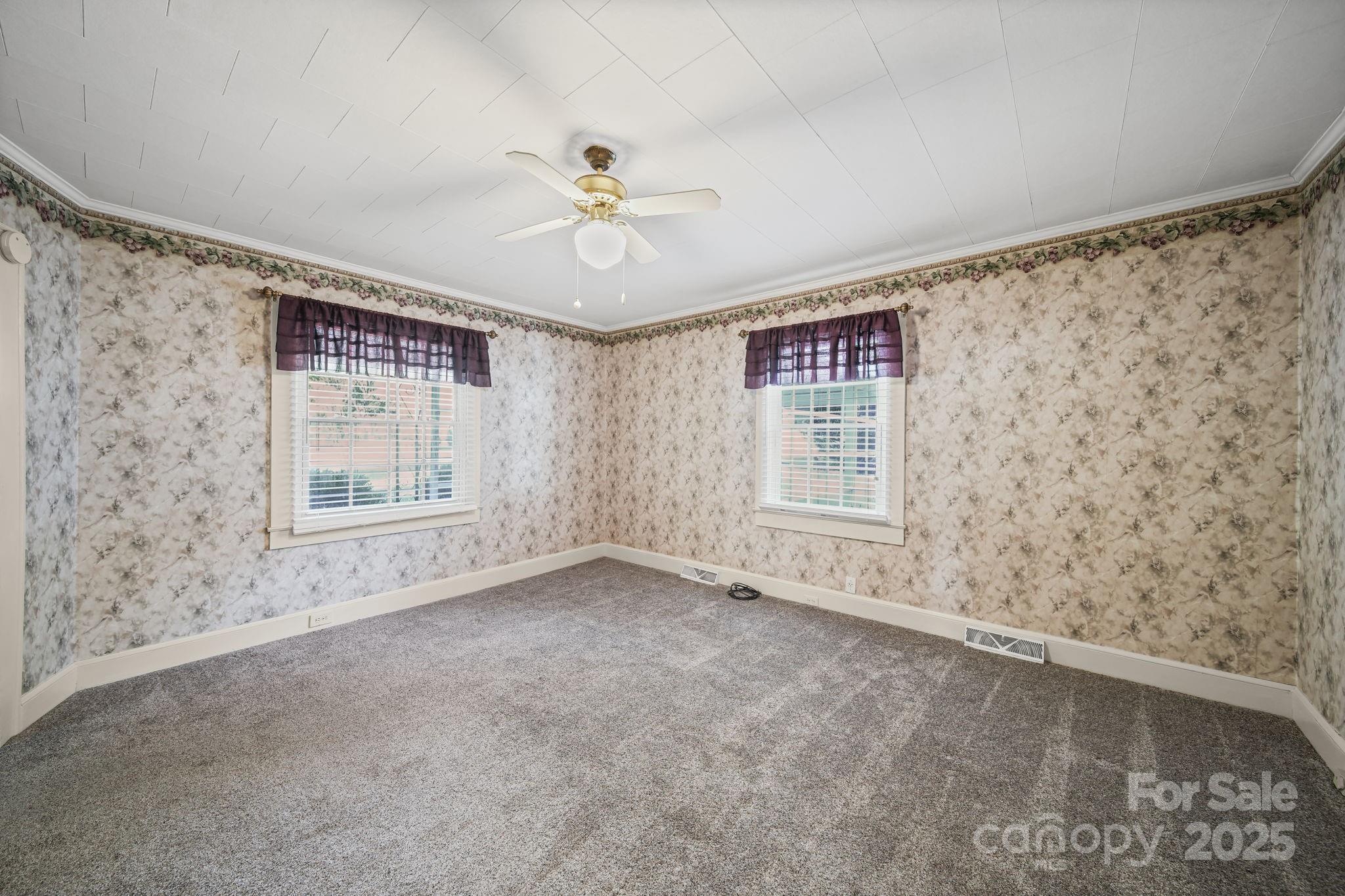 210 Smith Street Clover, SC 29710 - Photo 4 of 33 a view of an empty room with a window