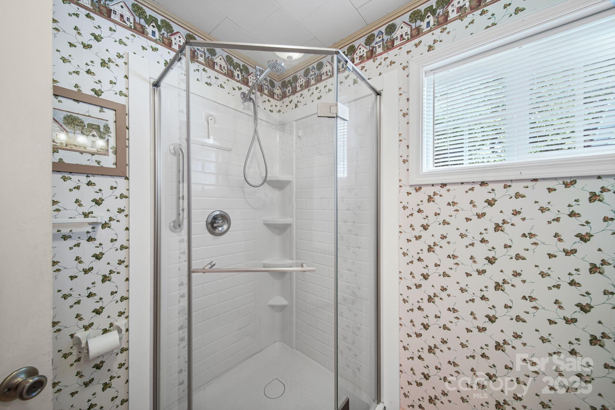 210 Smith Street Clover, SC 29710 - Photo 8 of 33 a bathroom with a shower curtain